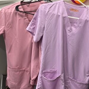 2 pink and purple Medium scrubs top and bottom